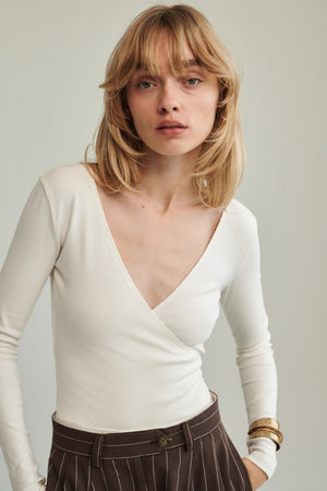 Bodysuit in organic cotton / 01 / 06 / cream white